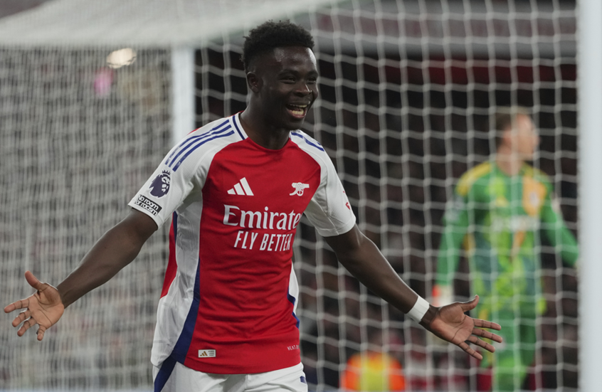 Arsenal beats Fulham to chase Premier League leaders Liverpool